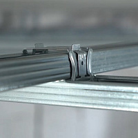 Соединитель двухуровневый Knauf  (0.9 мм) для CD-профиля